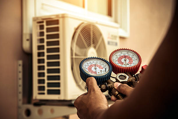 Professional Hvac technician working in Rossville, PA